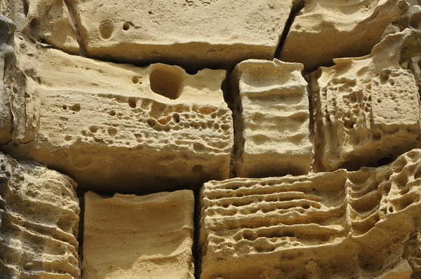 Piedras beige viejas y erosionadas — Foto de Stock