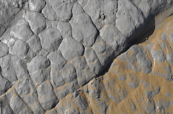 Erodovaná šedá rock textury některých pískem — Stock fotografie
