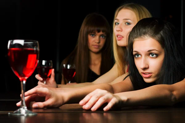 Young women in a night bar