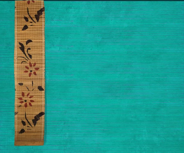 Květina bambusový banner na akvamarín žebrované dřevo — Stock fotografie