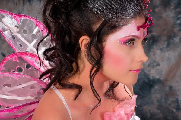 在化妆的妖精女子肖像 免版税图库图片