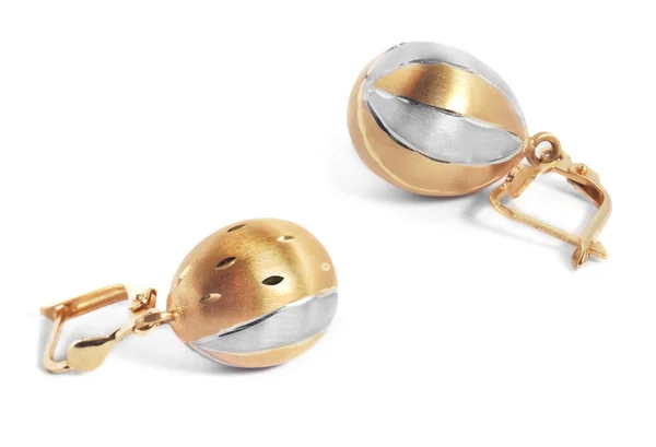 Golden earrings — Stock Photo, Image