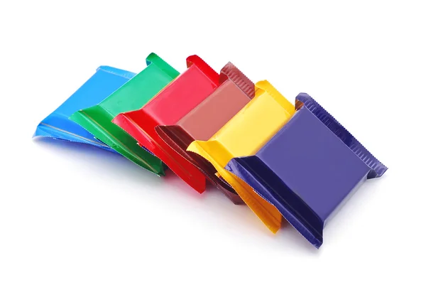 Chocolate en envolturas coloridas — Foto de Stock