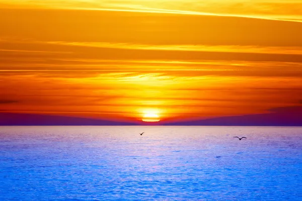 Západ slunce nad mořem — Stock fotografie