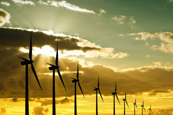 Wind turbines at sunset