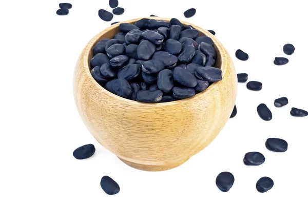 Black beans in a wooden bowl — Stock Photo, Image