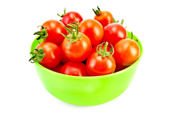 Tomatoes in green bowl — Stock Photo, Image