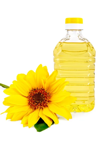 El aceite vegetal con la flor el girasol —  Fotos de Stock
