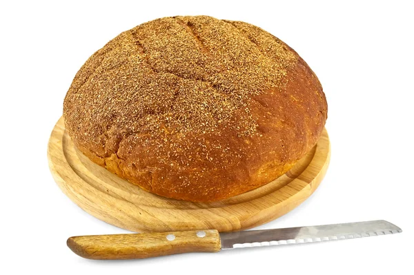 Wit brood met een mes — Stockfoto