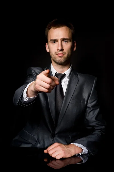 Üzletember az ujját mutatva — Stock Fotó
