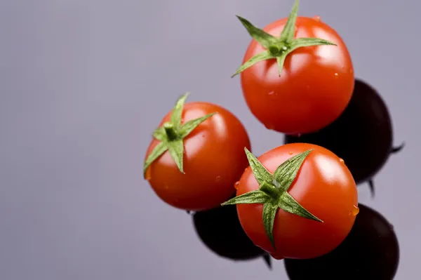 Três tomates — Fotografia de Stock