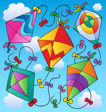 Various flying kites on blue sky clipart