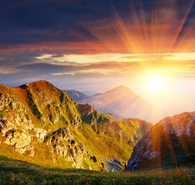 Sunrise in mountains clipart