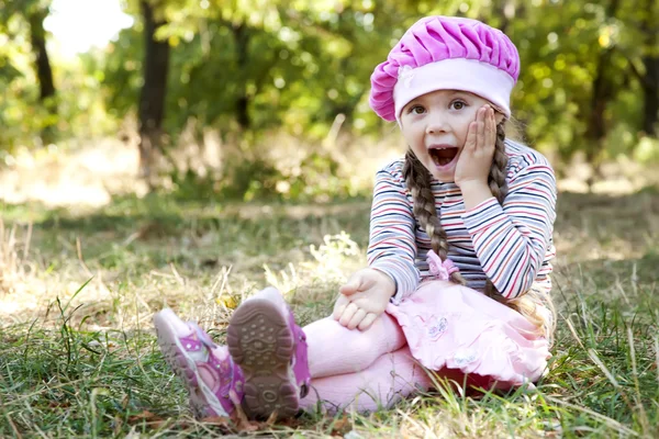 Cute little girl at outdoor in fall. — Stock Photo, Image