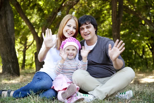 Young family at outdoor. — Stock Photo, Image