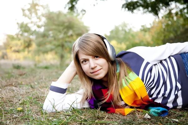 Portrait of girl with headphones at outdoor. — Stock Photo, Image