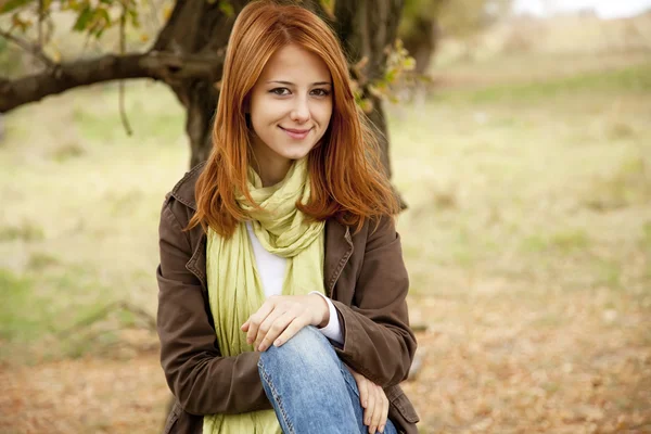 Beautiful girl at outdoor in autumn time — Stock Photo, Image