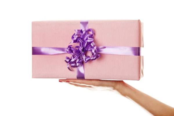 A box tied with a violet satin ribbon bow. — Stock Photo, Image