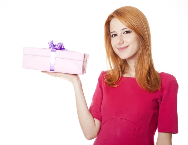 Red-haired girl in dress with present box — Stock Photo, Image