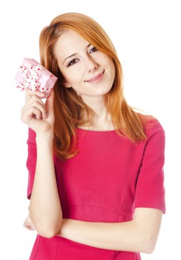 Beautiful red-haired girl with present box