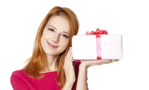 Beautiful red-haired girl with present box — Stok fotoğraf