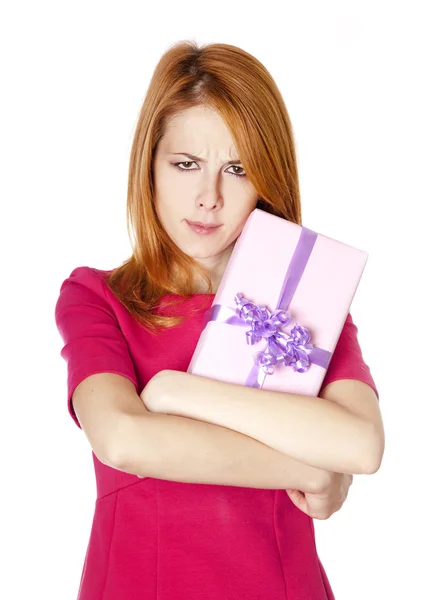 Sad red-haired girl with present box. — Stock Photo, Image