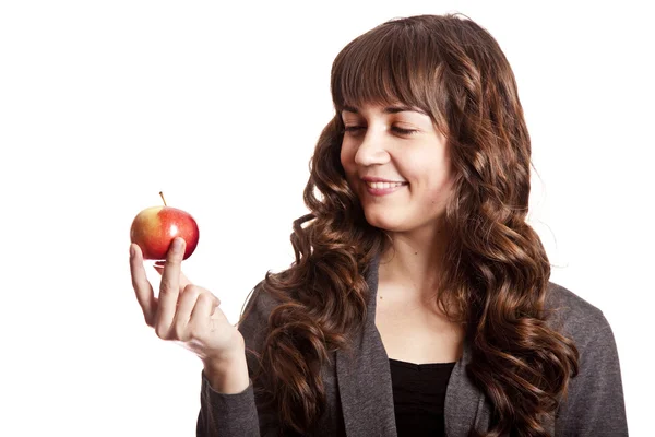 Barna lány, kezében almával. — Stock Fotó