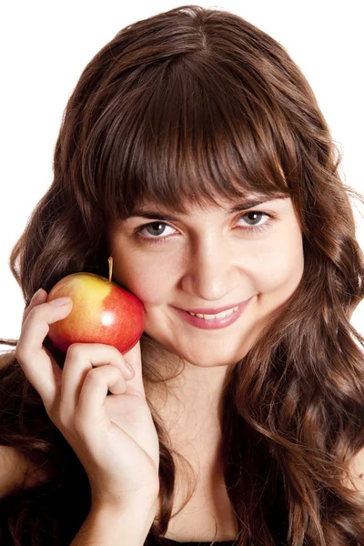 Brunett tjej med äpple — Stockfoto
