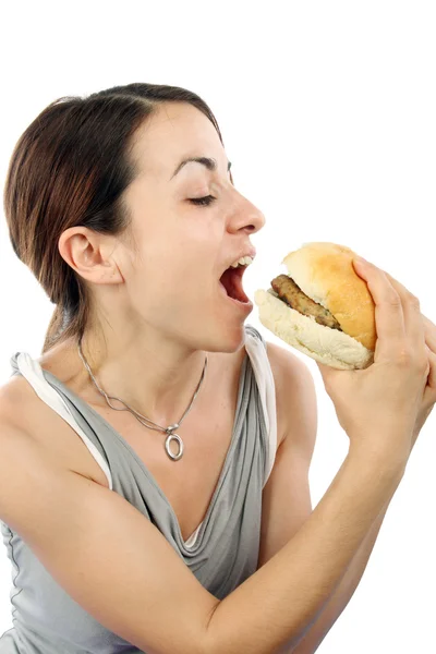 Mulher comendo hambúrguer — Fotografia de Stock