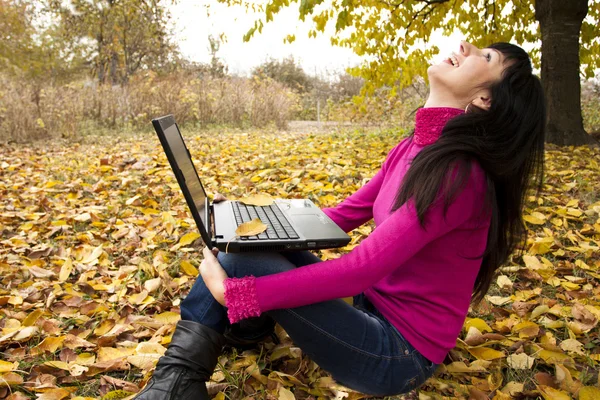 The woman with the laptop — Stock Photo, Image