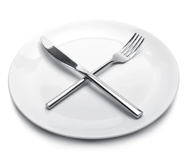 Piatto vuoto con cucchiaio e forchetta — Foto Stock
