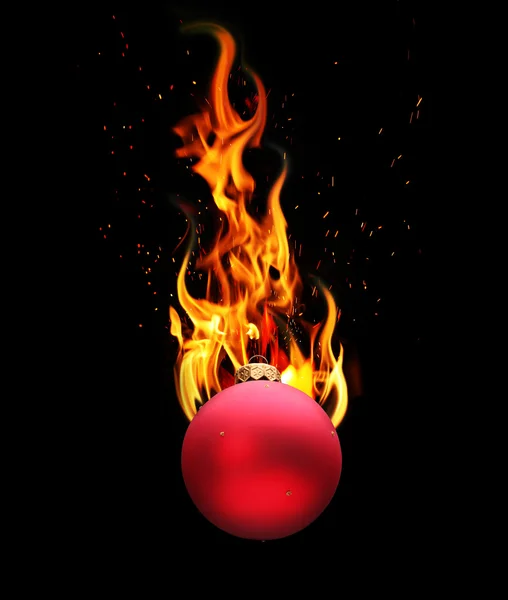 Christmas ball in fire — Stock Photo, Image