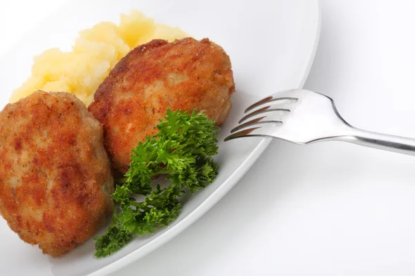 Roasted cutlets of pork with potato — Stock Photo, Image