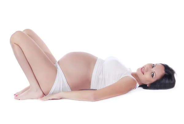 Femme enceinte sur blanc — Photo