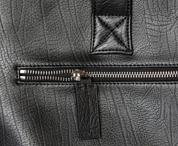 Closeup zipper on black leather — Stock Photo, Image
