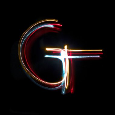 Letter G made from brightly coloured neon lights clipart