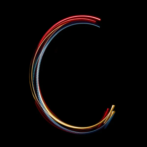Parlak renkli neon ışıkları yapılan harf c — Stok fotoğraf