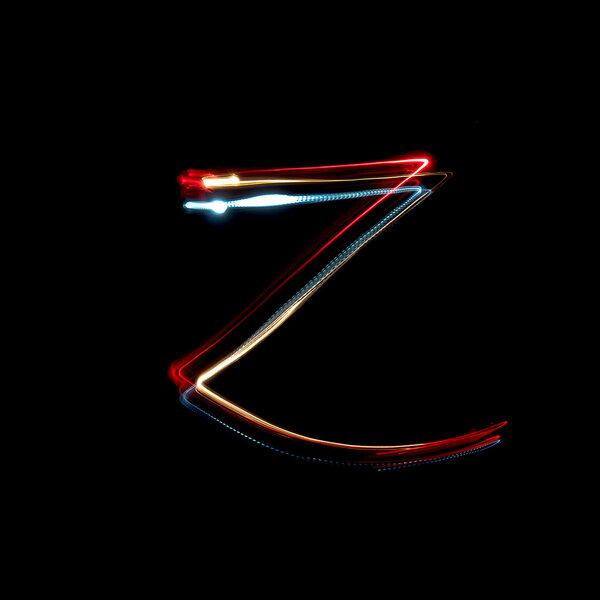 Буква Z сделана из ярко окрашенных неоновых огней
