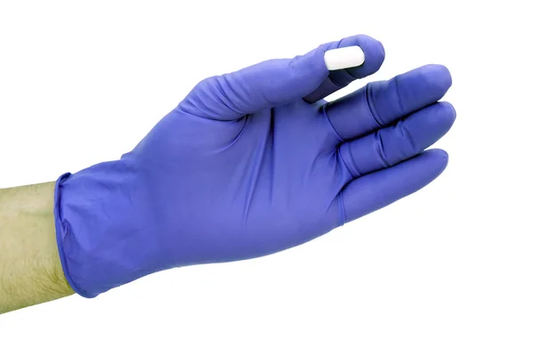 Χέρι γάντια με χάπι απομονωθεί — Φωτογραφία Αρχείου