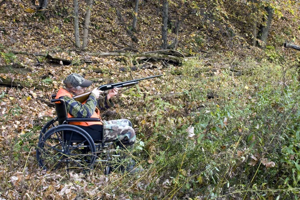 Wheelchair hunter — Stock Photo, Image