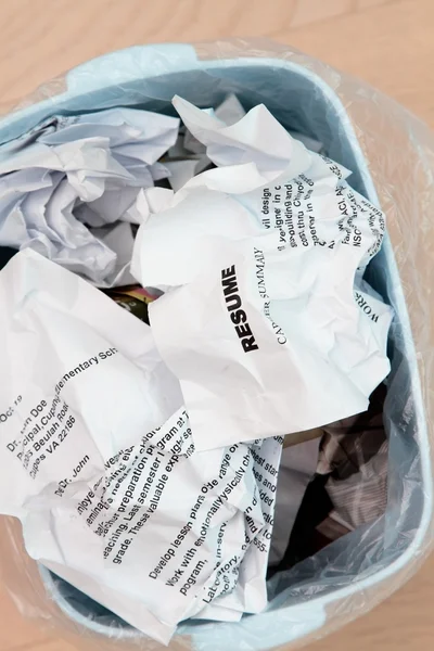 Resume crumpled up and tossed in frustration — Stock Photo, Image
