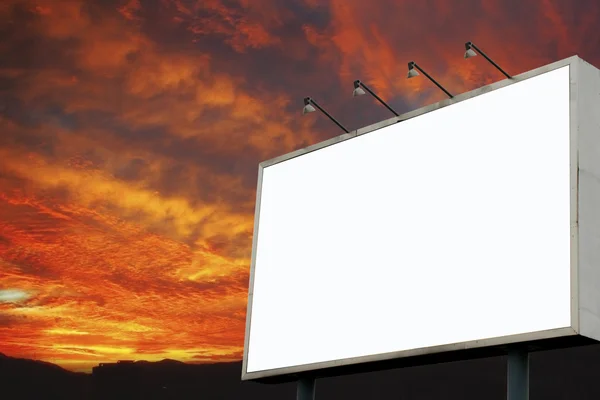 Billboard on a fiery morning clouds — Stock Photo, Image