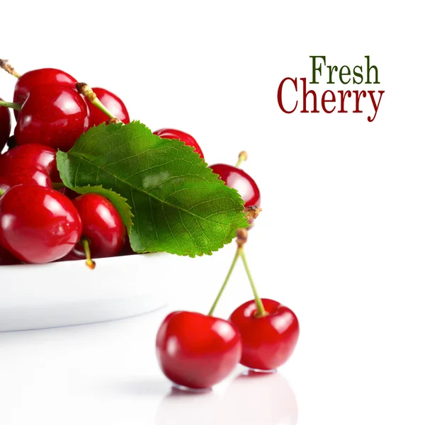 Fresh cherry berries with green leave — Stock Photo, Image