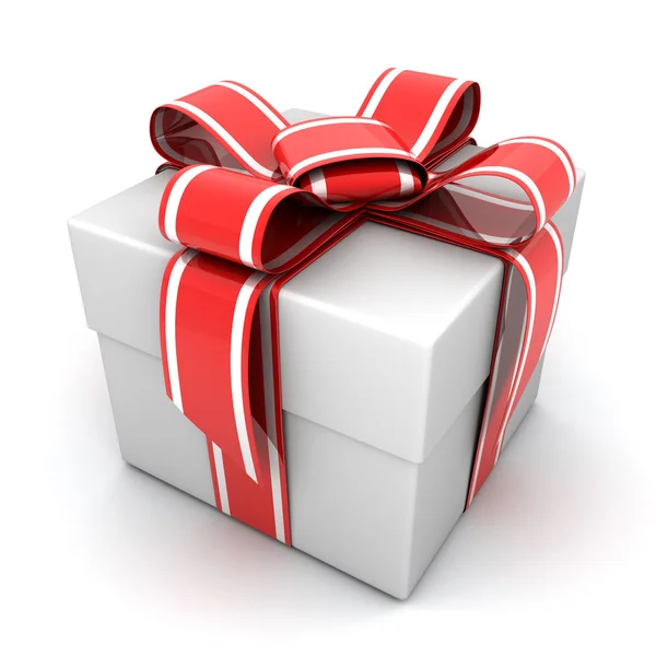 White gift and red ribbon — Stockfoto