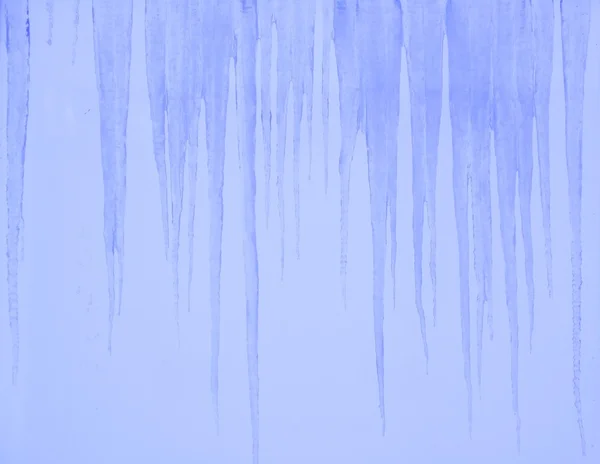 Icicles on the blue background — Stock Photo, Image