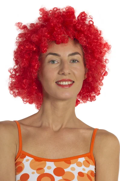Hermosa mujer con una peluca naranja — Foto de Stock