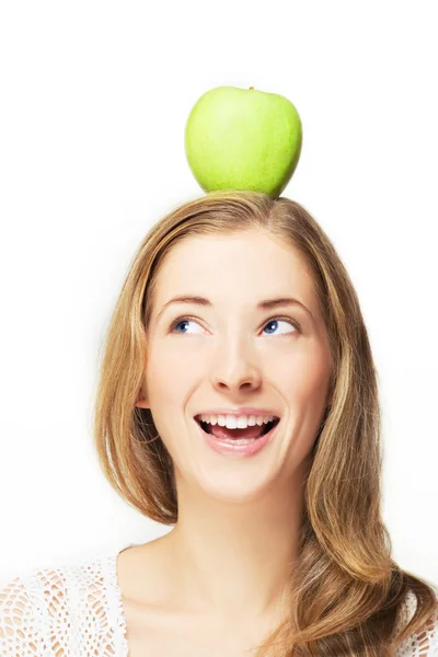 Apple on her head — Stock Photo, Image