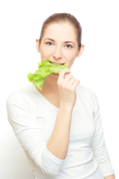 Young woman with lettuce leaf — Stock Photo, Image