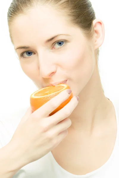 Young woman with orange — Stock Photo, Image