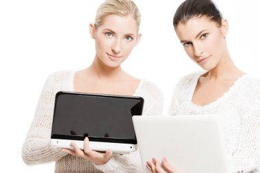 Two young women with netbooks clipart